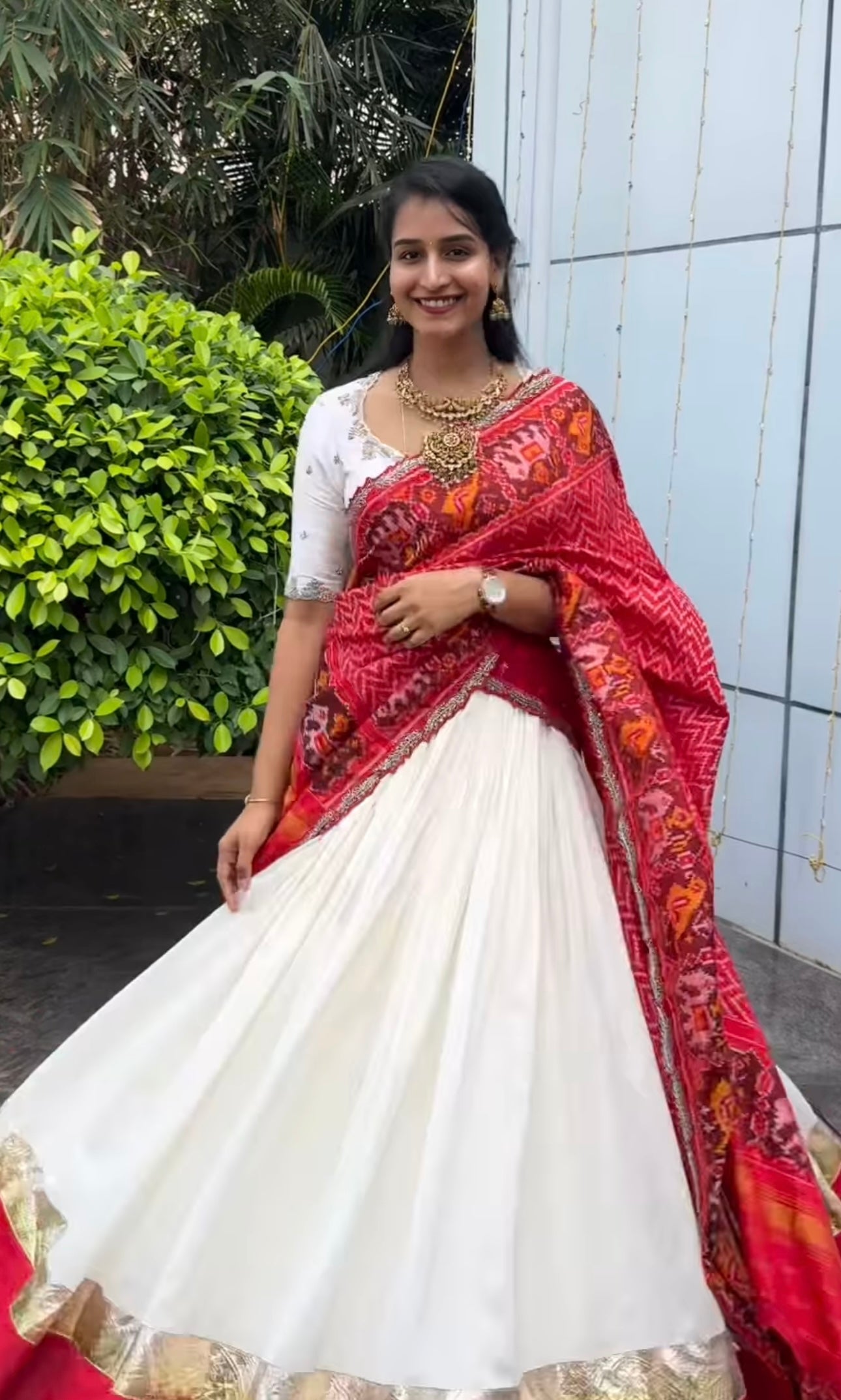 Elegant off white  Raw Silk Lehenga with  maroon Ikkat Patan Patola Dupatta and Maggam Blouse