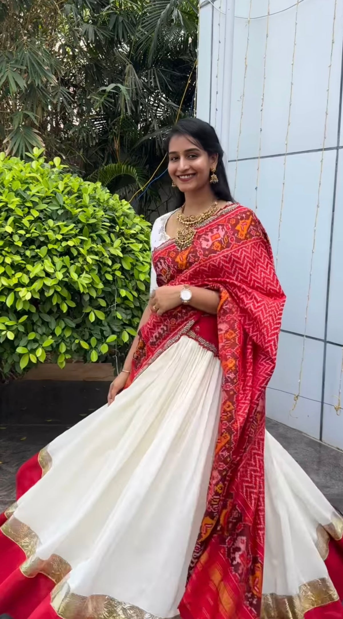 Elegant off white  Raw Silk Lehenga with  maroon Ikkat Patan Patola Dupatta and Maggam Blouse