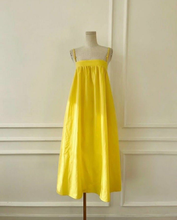 Elegant Yellow Sleeveless Floor-Length Dress - Handcrafted and Flowing Design