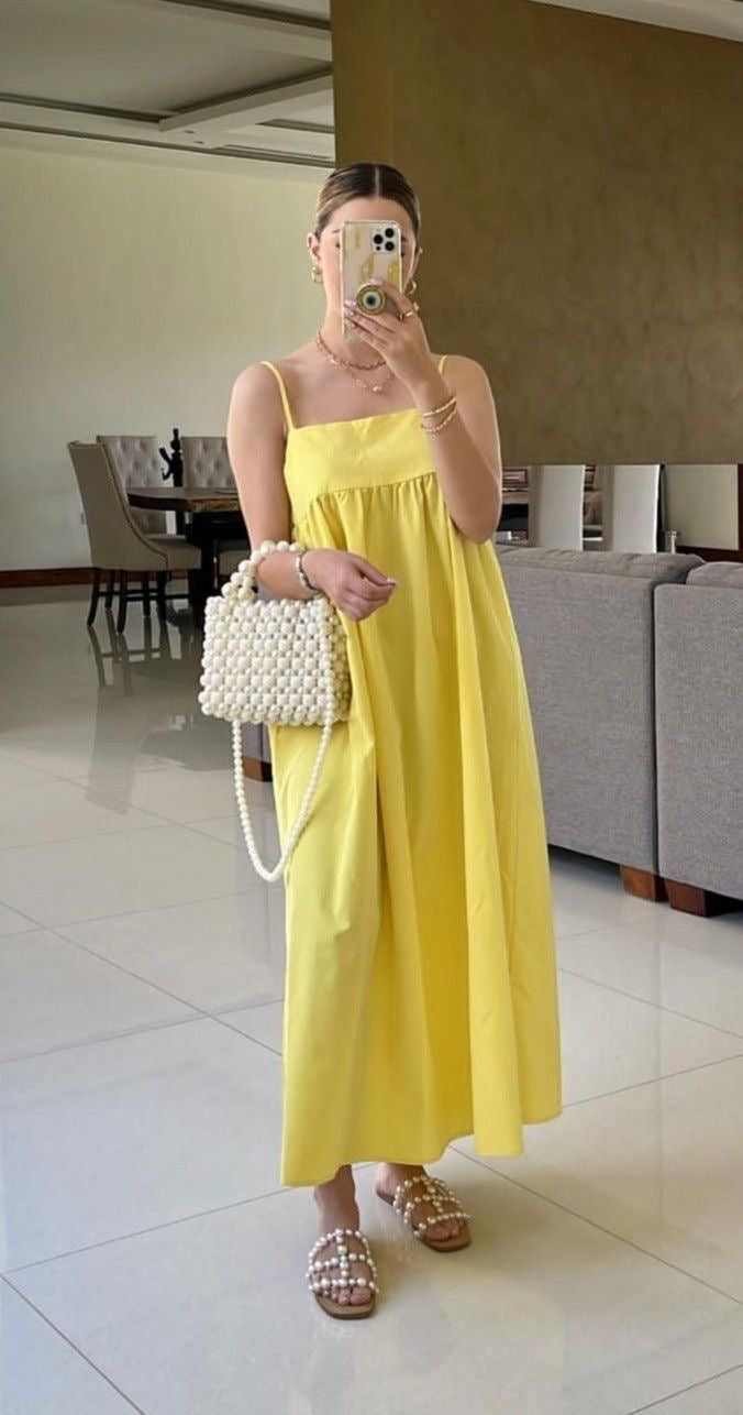 Elegant Yellow Sleeveless Floor-Length Dress - Handcrafted and Flowing Design