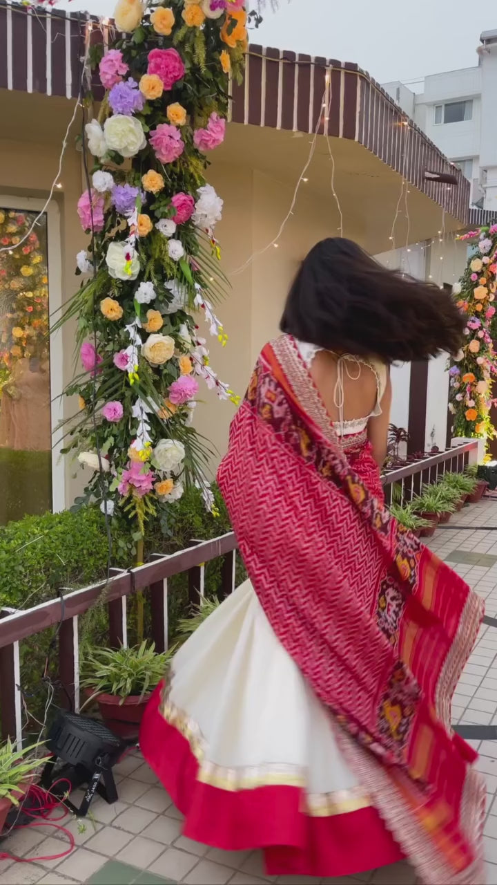 Elegant off white  Raw Silk Lehenga with maroon  Ikkat Patan Patola Dupatta and Maggam Blouse